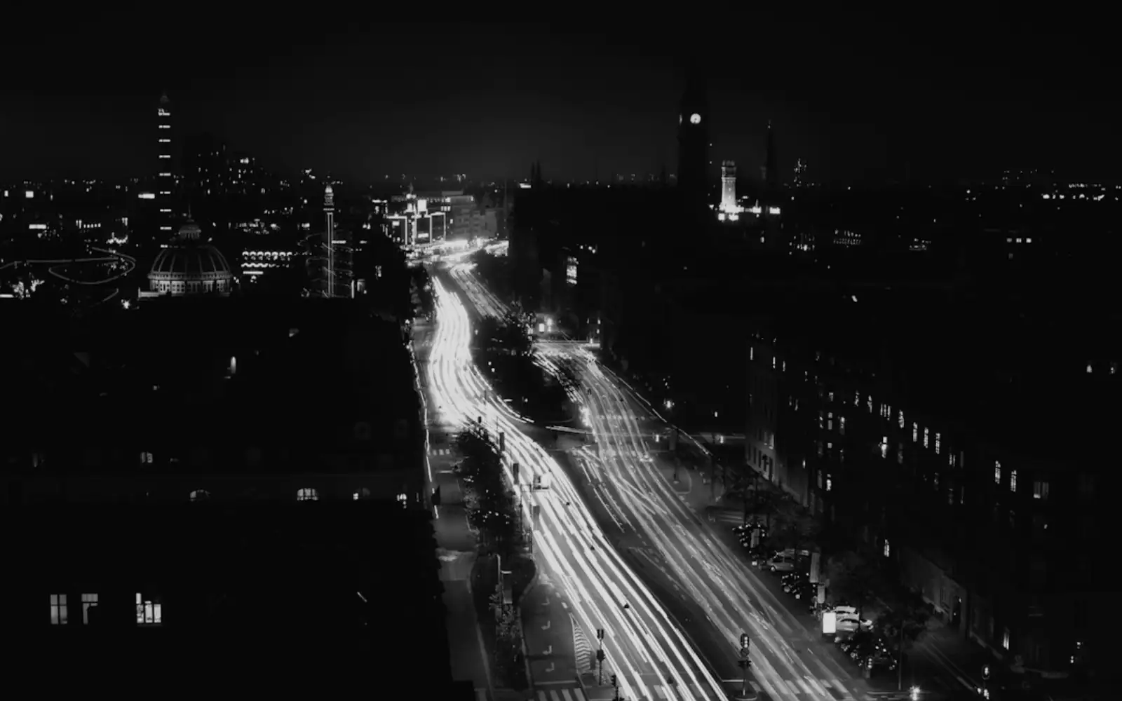 A city at night with light trails